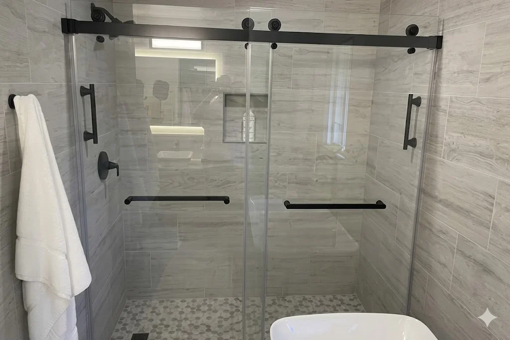 Plumber installing fixtures in bathroom