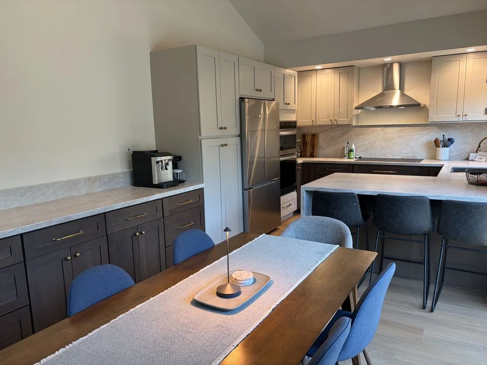 Remodeled kitchen in an Encinitas California home featuring open-concept layout, updated cabinetry, and countertops suited to the coastal environment. Interior view showing clean lines and natural light consistent with North County San Diego residential style.